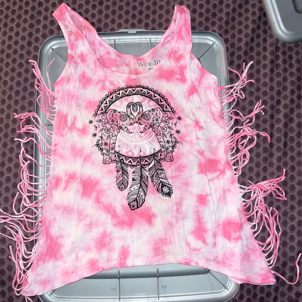 A pink and white tie dye shirt